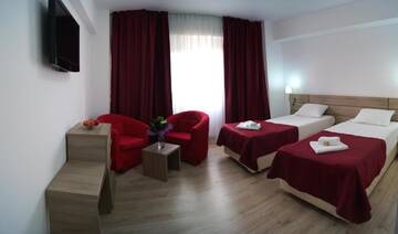 Фото номера Двухместный номер с 2 отдельными кроватями Отель Hotel Otopeni г. Отопень 5
