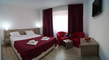Фото номера Двухместный номер с 2 отдельными кроватями Отель Hotel Otopeni г. Отопень 6